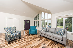 living room with custom flooring and led lighting