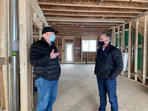 MP_James_Cumming_discussing_infill_at_build_site